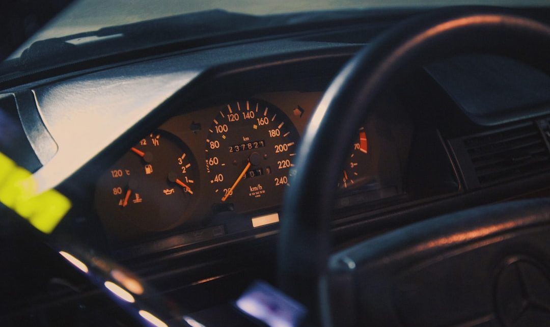 close-up view of a car dashboard with speed and fuel gauges